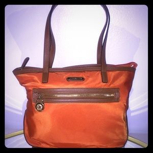 Michael Kors orange handbag
